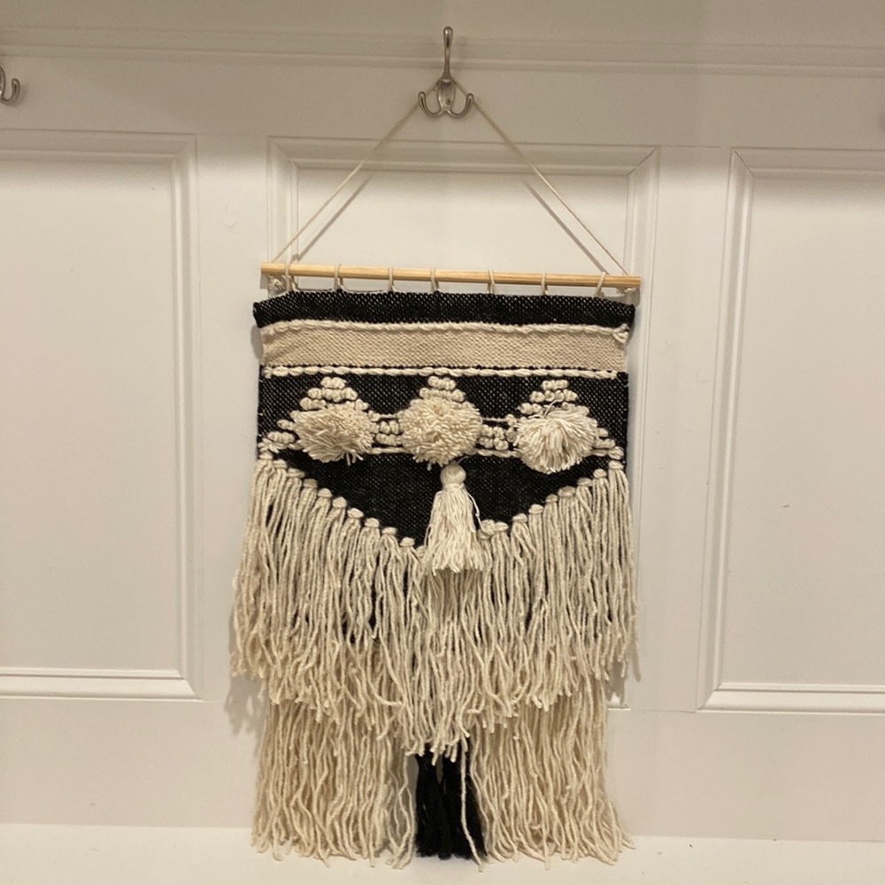 Large macrame wall decor hanger. Black cream macrame with wood hanging fixture.